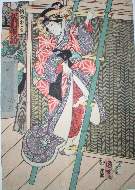 Onnagata in elaborate richly coloured kimono on ladder