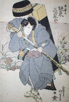 Triptych right panel, actor drawing katana, tall chest on his back