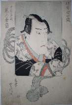 Actor in mirror frame in kimono decorated with chidori